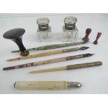 Three vintage marbled dip pens, a concealed pencil, a mother of pearl and gilt brass dip pen,