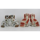 Staffordshire flatbacks; two pairs of seated Staffordshire Spaniels, one pair in red 25cm high,