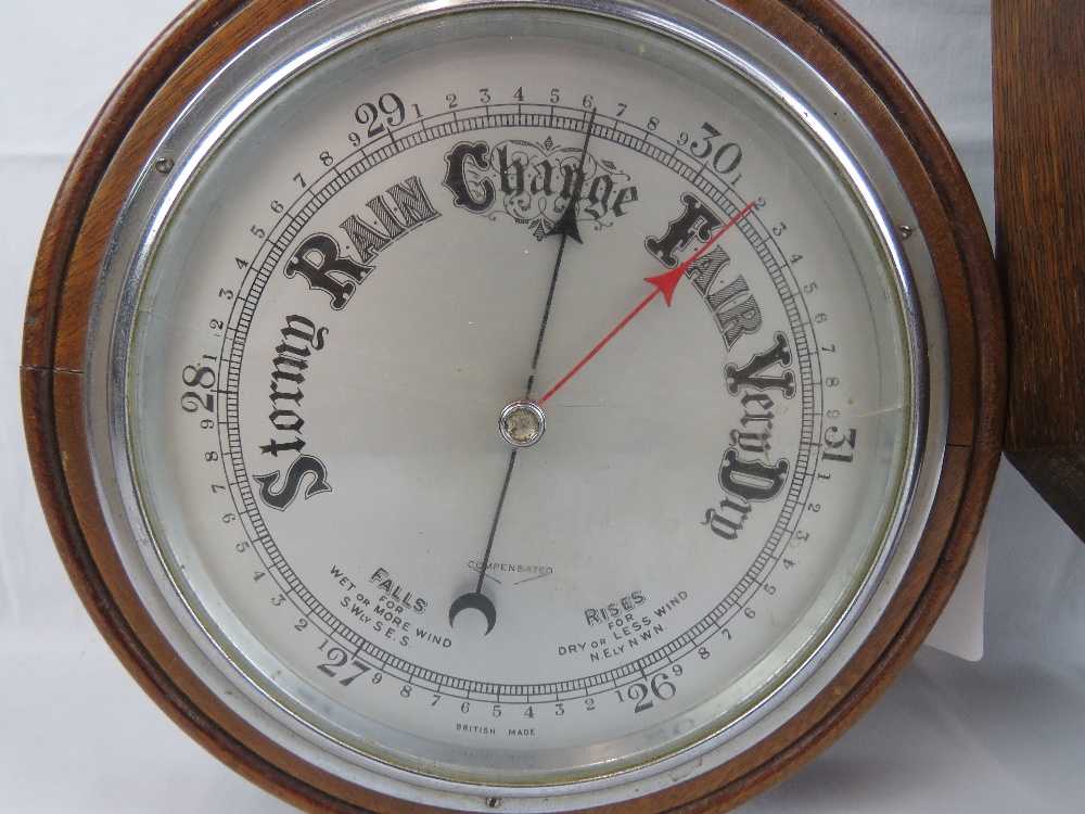 A compensated circular aneroid barometer in mahogany frame, 22cm dia, - Image 4 of 4