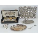 A quantity of assorted silver plated items including brush and comb in box, three trays,