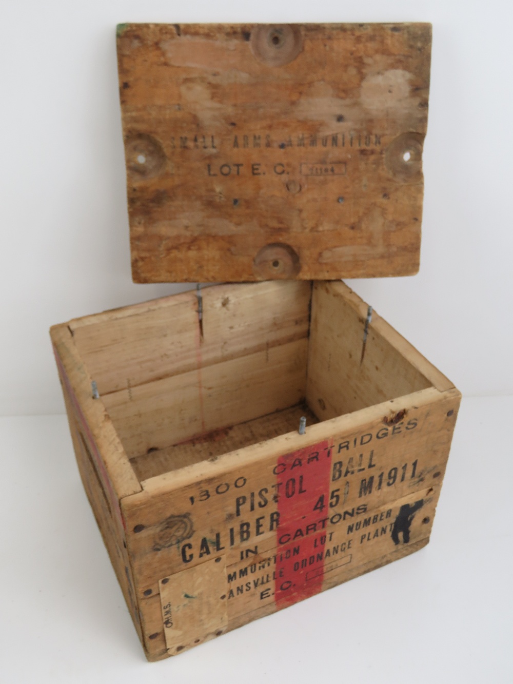 A Colt M1911 .45 wooden ammo crate to hold 1800 rounds.
