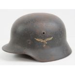 A WWII German M40 Luftwaffe helmet having single decal upon, with liner.