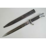 A WWII German K98 Parade bayonet, blade marked for Alcoso Solingen and measuring 25cm in length,