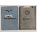 A WWII German pilot flight book together with a Luftwaffe Wehrpas. Two items.