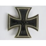 A WWII German Iron Cross 1st class badge.