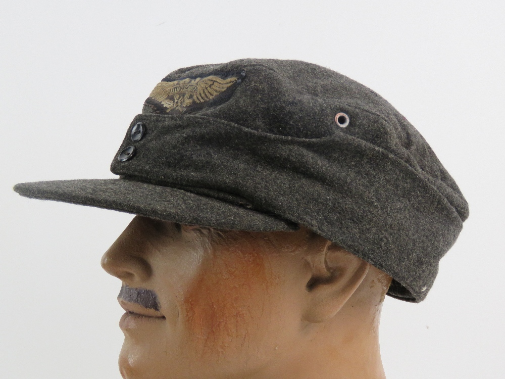 A WWII German Luftschutz Homeguard ski cap.