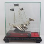 A white metal Chinese Dhow model ship ha