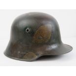 A WWI German M16 Camo Helmet Stahlhelm, with liner.