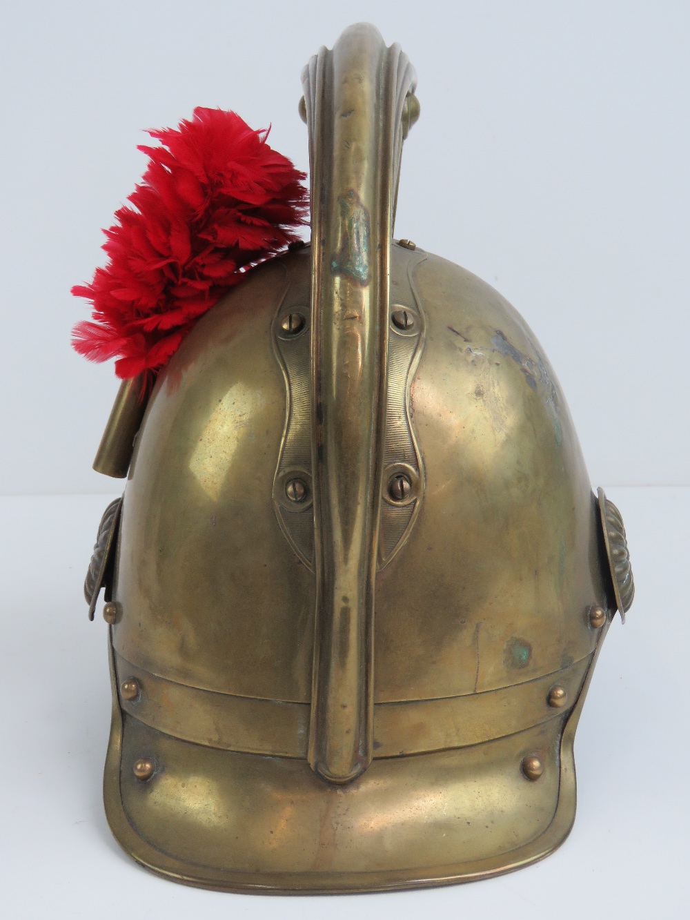 A French 19th century fireman's helmet in brass having red plume upon. - Image 3 of 6