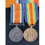 Two WWI British miniature medals in box, George V and The Great War.