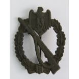 A WWII German Infantry Assault badge having WH makers mark to back.