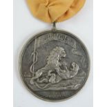 An Honourable East India Company medal for Seringapatam 1799, with ribbon, silver, 48mm, Soho Mint.