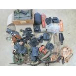 A box containing a quantity of holsters, slings, bayonets scabbards, mosquito net,