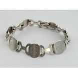 A privately made chain link bracelet having SS engraved upon, marked 835, 19.5cm in length, 23.4g.