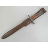 A Canadian Ross rifle bayonet 1907 patent, with leather scabbard and frog.