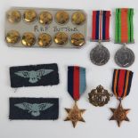 Four WWII British medals; the defence medal, George V medal, the Burma star, and 39-45 star.
