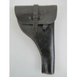 A WWII German Walther flair pistol holder in black leather with maker and German marks upon and