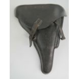 A WWII German black leather P08 holster dated 1941 having German markings upon.