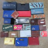 A quantity of assorted pistol boxes with inserts