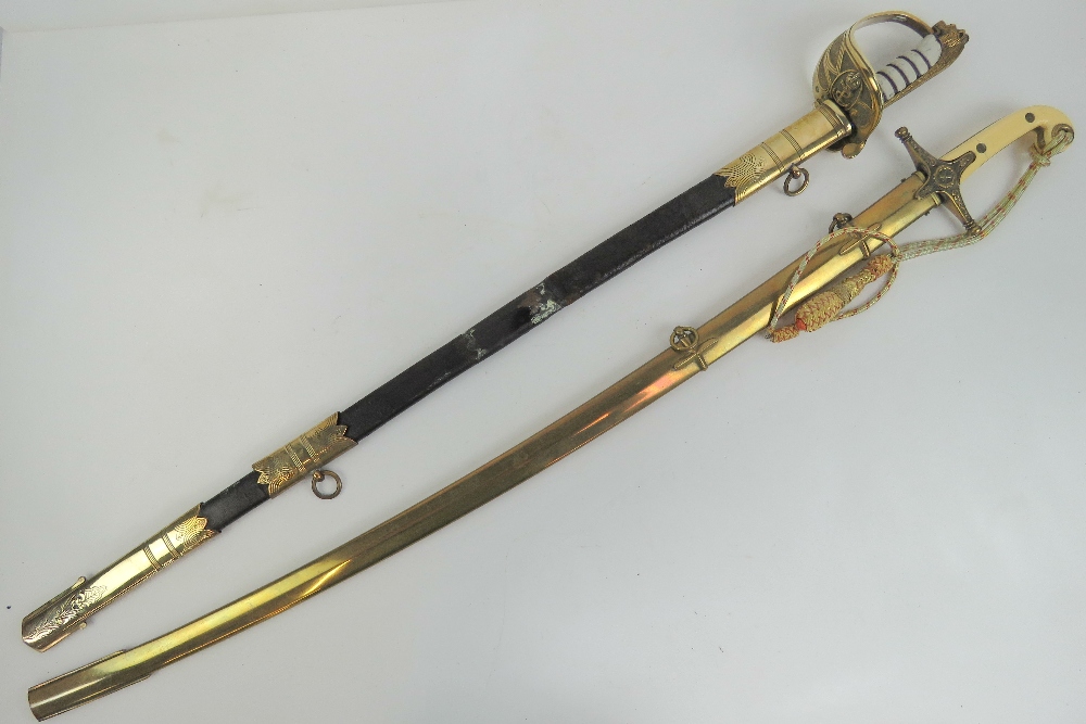 Two swords, one Naval and one Cavalry, each with scabbard.