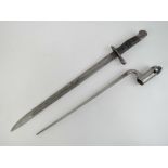A WWI 1913 pattern P14-17 Remington bayonet dated 1917 together with a socket bayonet. Two items.
