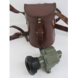 An MG42 Lafette scope in fitted leather carry case with accessories including brush and lens.