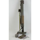 A WWII US 60mm mortar cleaning kit, having brush, carry strap, end cap and heat cover.