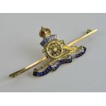 A 15ct gold and enamel British Royal Artillery badge,