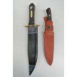 A Hattoni knife in sheath together with a liberty or death knife in sheath. Two items.