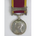 A Second China War Medal with ribbon and bar for Canton 1857, '95 Co. W. Wills SergT. R.M.L.