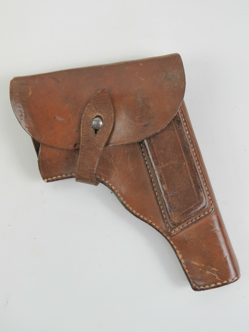 A WWII German Vis Radom holster and spare magazine.