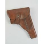 A WWII German Vis Radom holster and spare magazine.