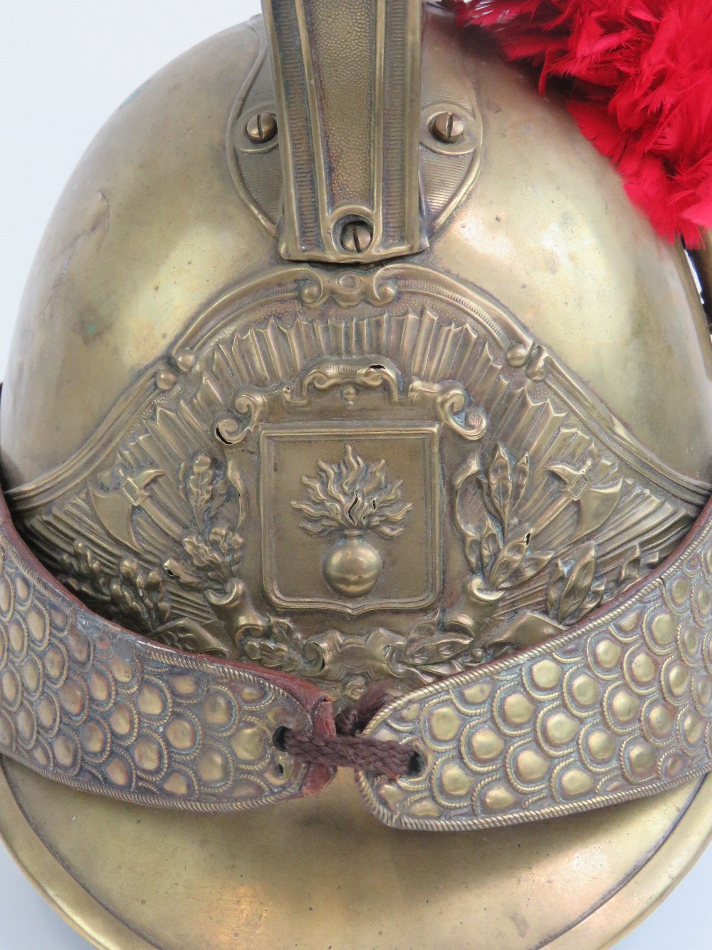 A French 19th century fireman's helmet in brass having red plume upon. - Image 5 of 6