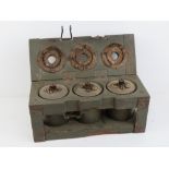 Three WWII German S mines in original case with transit plugs.