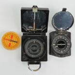 A WWII British Army compass made by T G Co Ltd, having broad arrow upon.