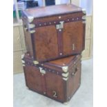 A fine pair of 'Army and Navy' style leather covered military trunks each bearing military insignia