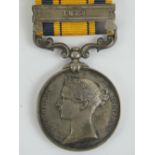 A South African Zulu war medal (1880) with ribbon and bar for 1879,