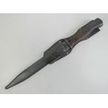 A WWII German K98 Bayonet with scabbard and leather frog dated 1944.