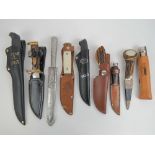 Nine assorted knives with sheaths; Hercules Inox, Solingen made 'Indian Chief' knife,