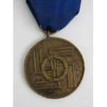 A WWII German SS Service medal with ribb