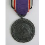 A WWII German Luftschutz medal with ribb