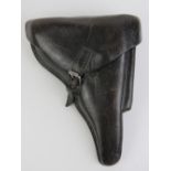 A WWII German Luger PO8 holster having German marks upon, made in Berlin and dated 1940,