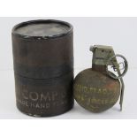 An inert US Vietnam War M67 grenade in original stores pot.