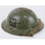 A WWII Gurkha Infantry helmet, with liner, made by Briggs Motor Body Works Dagenham, dated 1939.