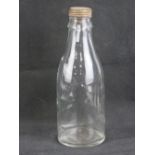 A late WWII German glass Molotov Cocktail bottle with lid (Volkssturm), 28cm high.