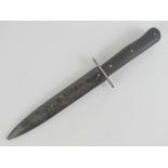 A WWII German boot knife with 17.5cm blade, German markings upon, with sheath.
