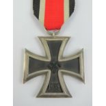 A WWII German Iron Cross 2nd Class with ribbon, marked 65 to ring.