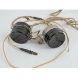 A WWII Japanese radio headset with wires.