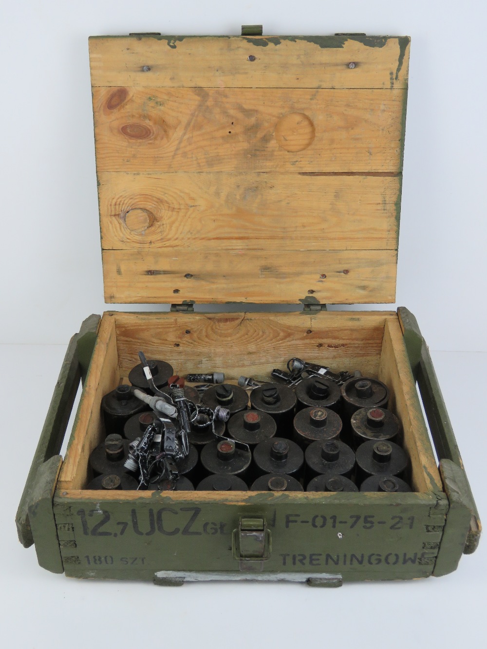Twenty-four inert RG-42 grenades, plastic transit plugs a/f, in box.