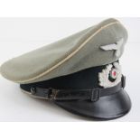 A WWII German Infantry NCOs peaked cap, label within.